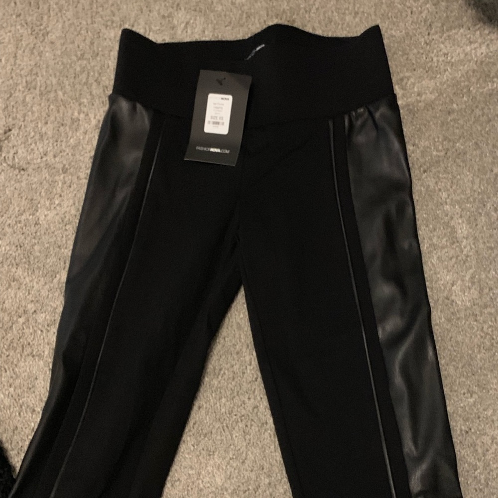 Black leggings with leather down the side of legs